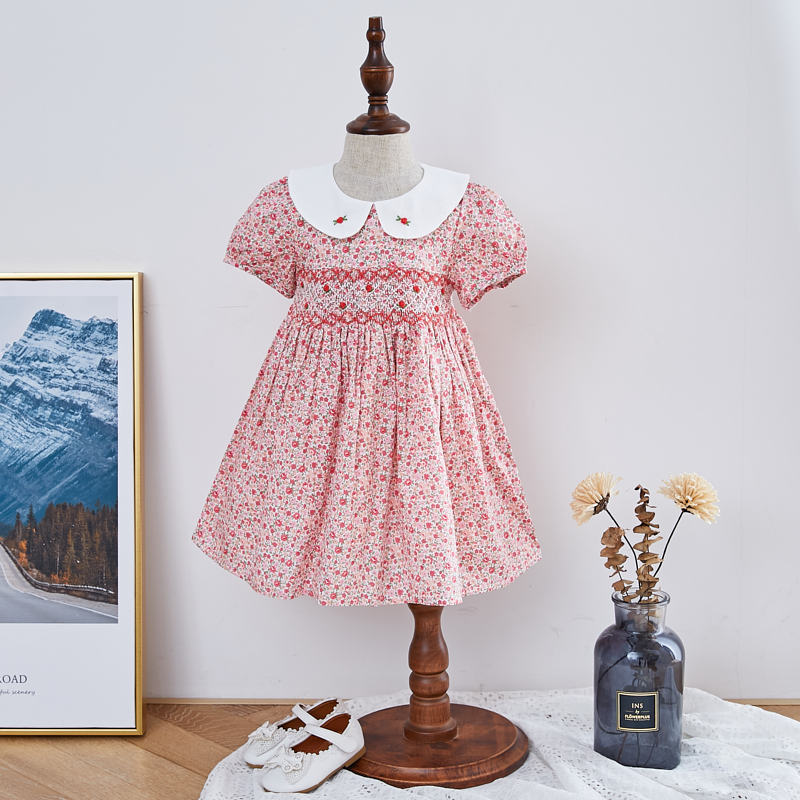 Hand Smocked baby girl dress. 