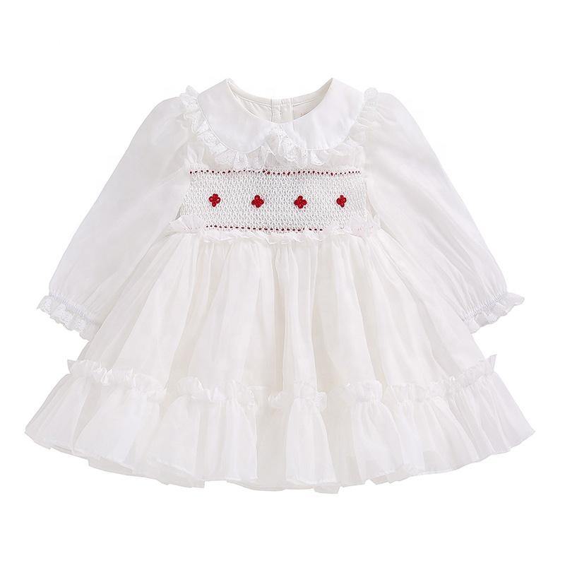 hand smocked with peter pan collar